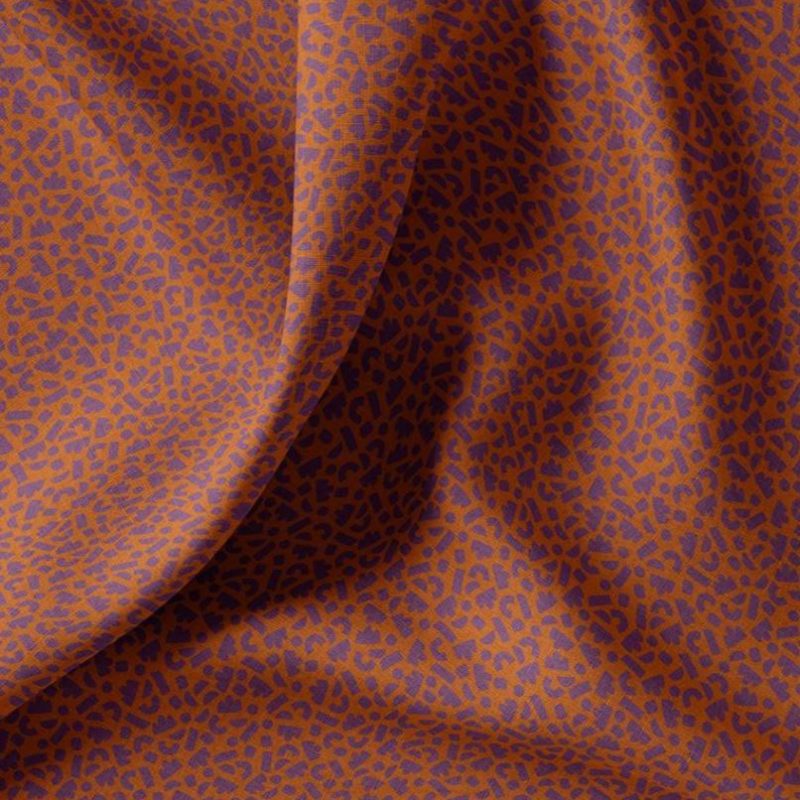 Cretonne formes sur fond terracotta