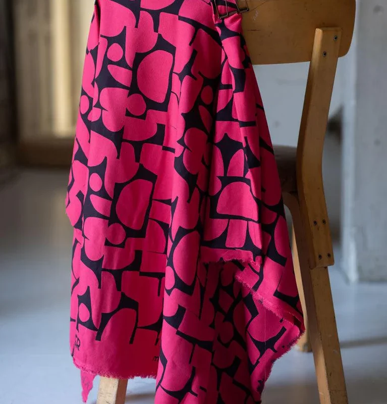 Crêpe de viscose à motif abstrait fuchsia