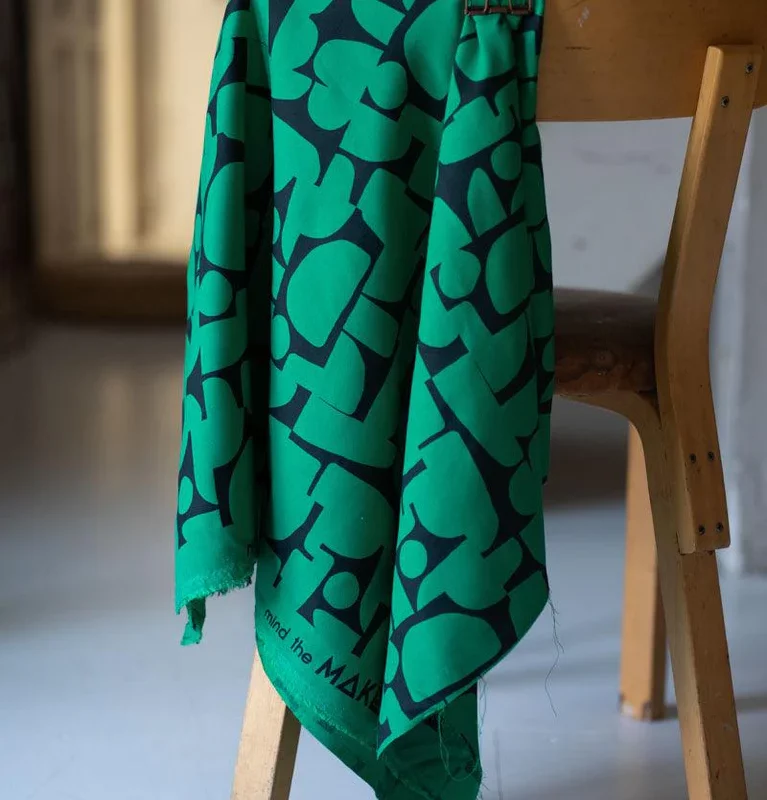 Crêpe de viscose à motif abstrait vert